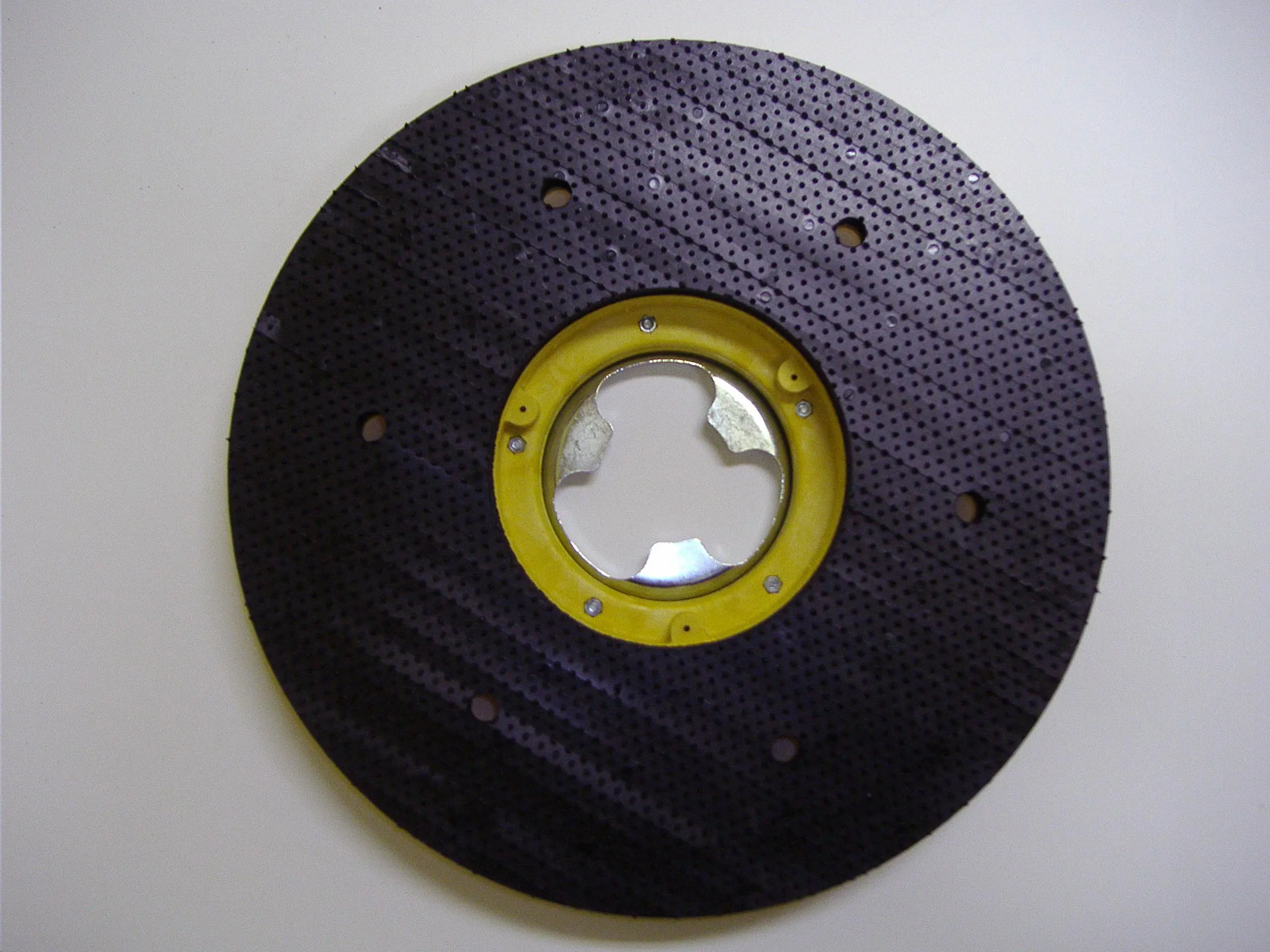 Sweeper disk for floor manding machine